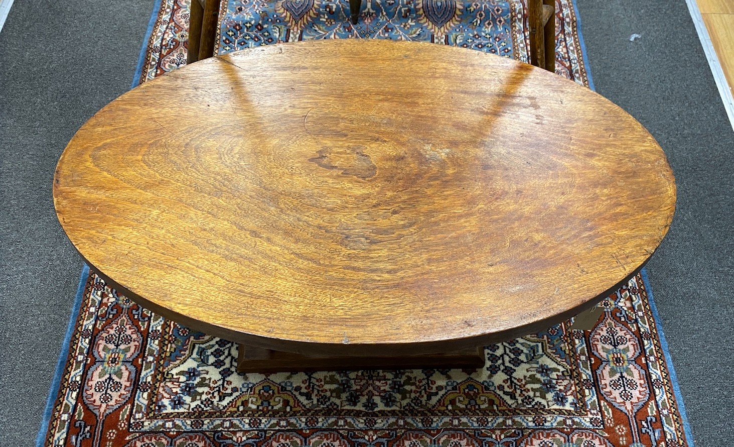 An African oval hardwood elephant occasional table, width 92cm, depth 58cm, height 51cm